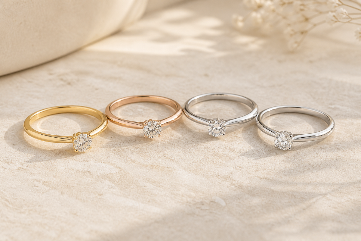 Moissanite solitaire rings in yellow, rose, white and platinum-tone metals