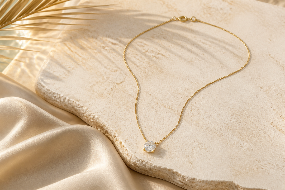 Solitaire moissanite pendant on a fine gold chain