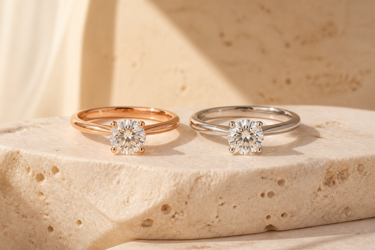 Moissanite and lab-grown diamond solitaire rings compared in warm UAE-inspired light
