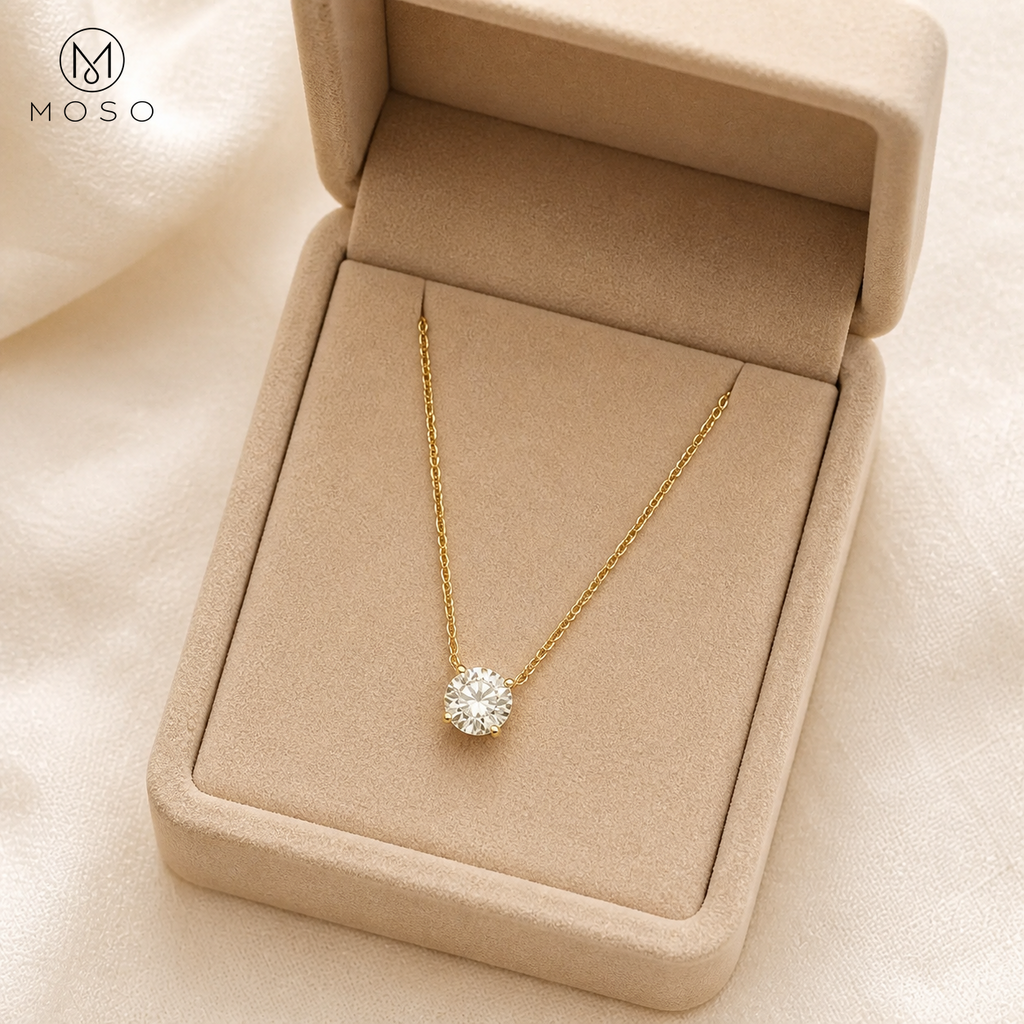 Abigail gold tone moissanite necklace in beige jewellery box