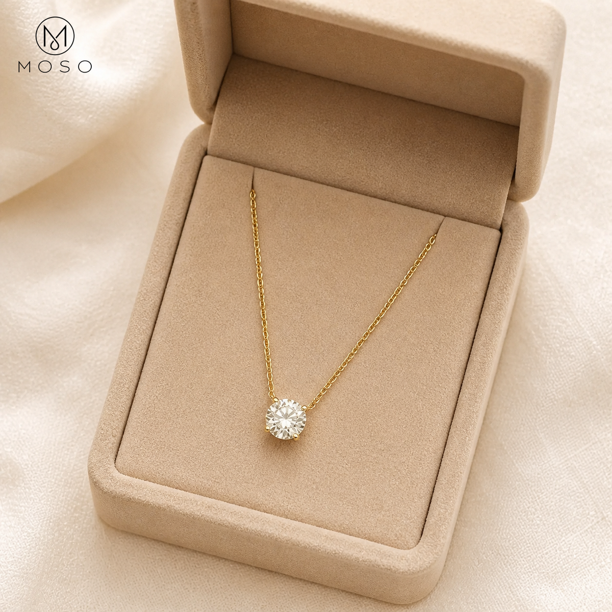 Abigail gold tone moissanite necklace in beige jewellery box