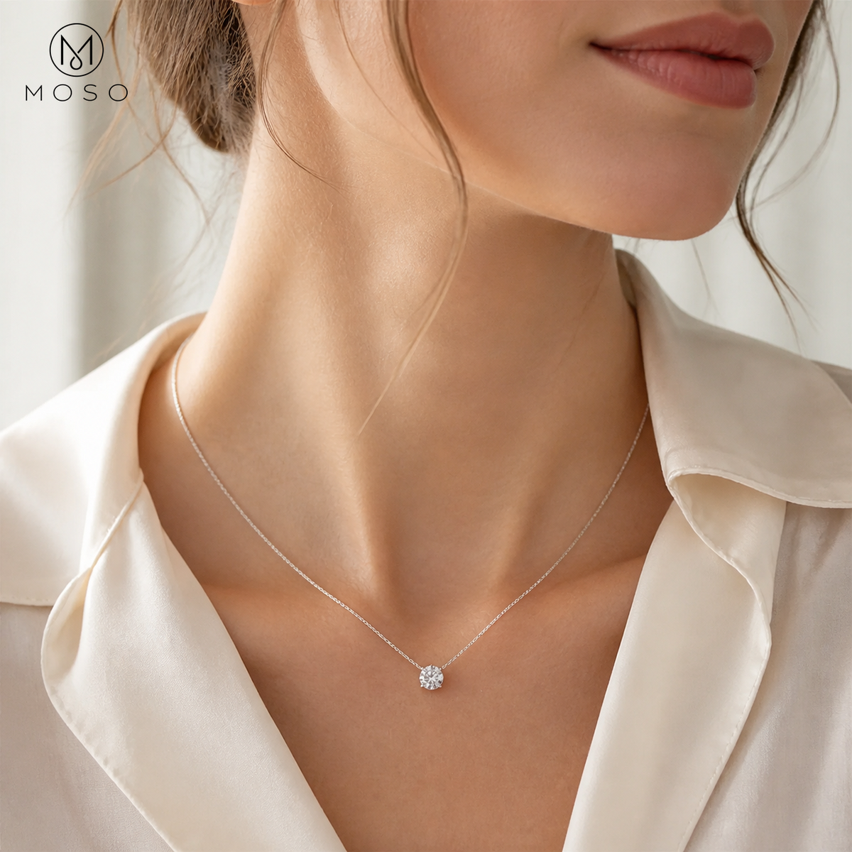 Woman wearing Abigail silver tone moissanite solitaire necklace