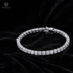 Addison round moissanite tennis bracelet on black velvet