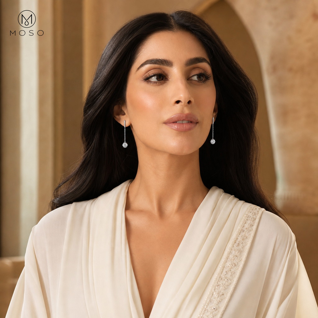 Alice moissanite long drop earrings worn with an ivory look