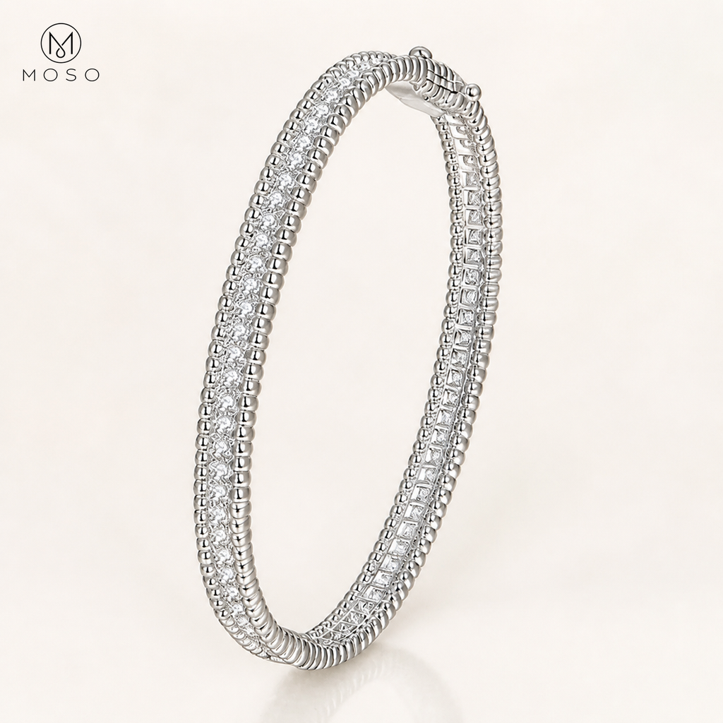 Aria silver tone 2mm moissanite bangle on ivory background