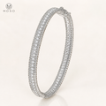 Aria silver tone 2mm moissanite bangle on ivory background