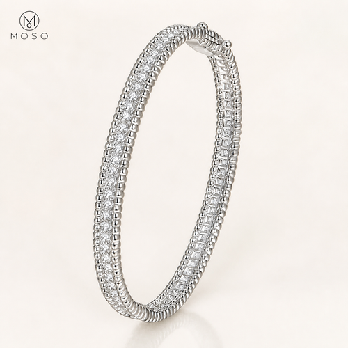 Aria silver tone 2mm moissanite bangle on ivory background