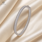 Aria silver tone round moissanite bangle on ivory silk