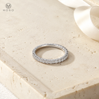 Ashley 3mm moissanite full eternity ring on pale travertine