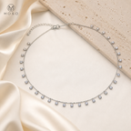 Aurora 4 mm moissanite drop necklace luxury ivory flat lay
