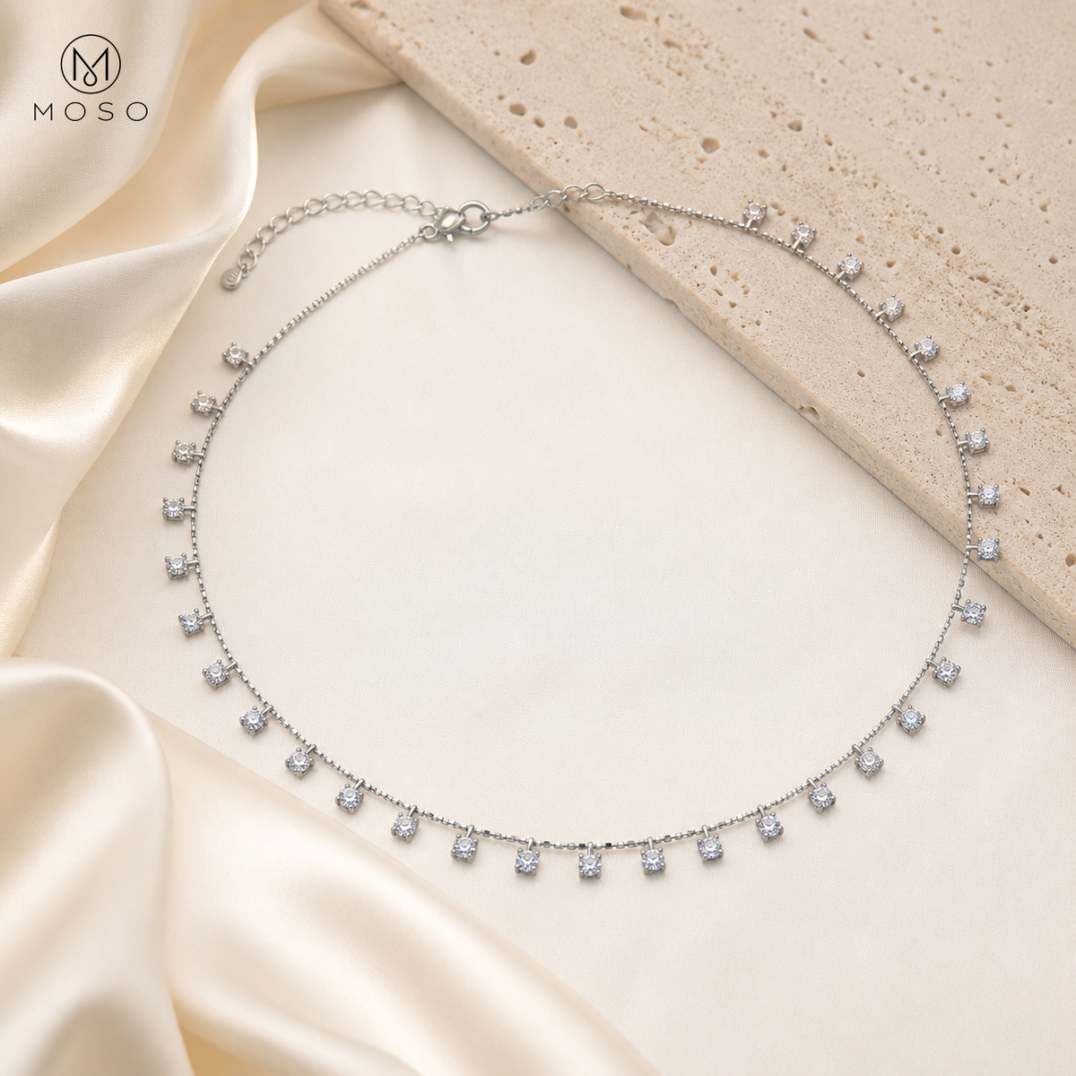 Aurora 4 mm moissanite drop necklace luxury ivory flat lay