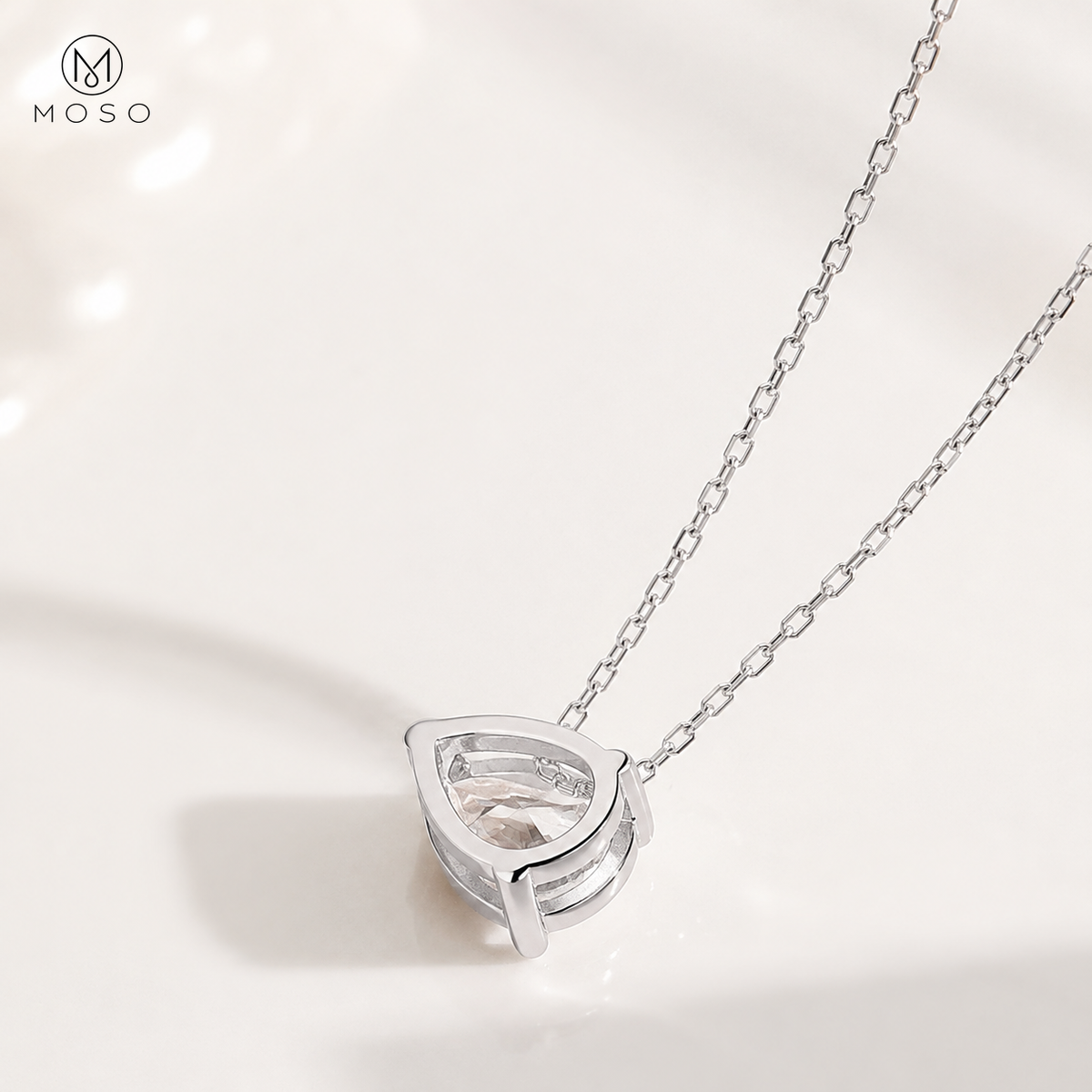 Ava pear cut moissanite pendant open basket reverse view