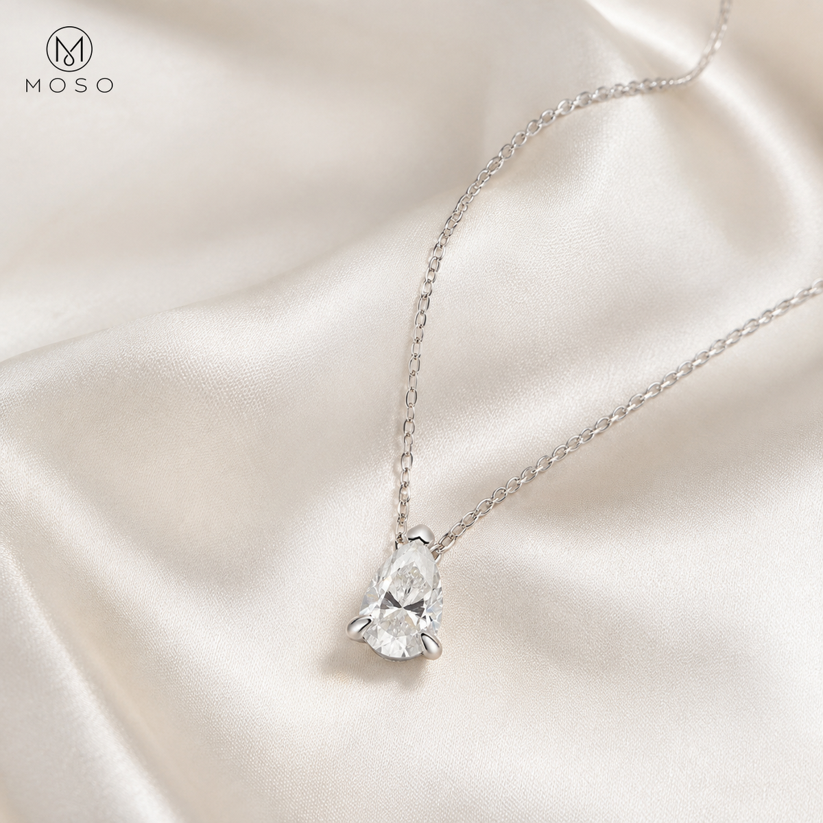 Ava pear cut moissanite necklace on ivory silk