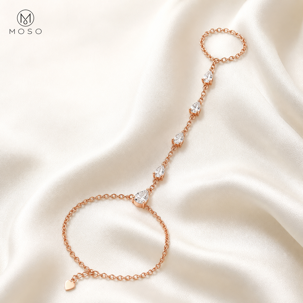 Brooklyn rose gold colour pear cut moissanite hand chain bracelet on ivory silk