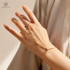 Brooklyn gold colour pear cut moissanite hand chain bracelet worn on hand