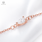 Brooklyn pear cut moissanite side profile and chain connection detail