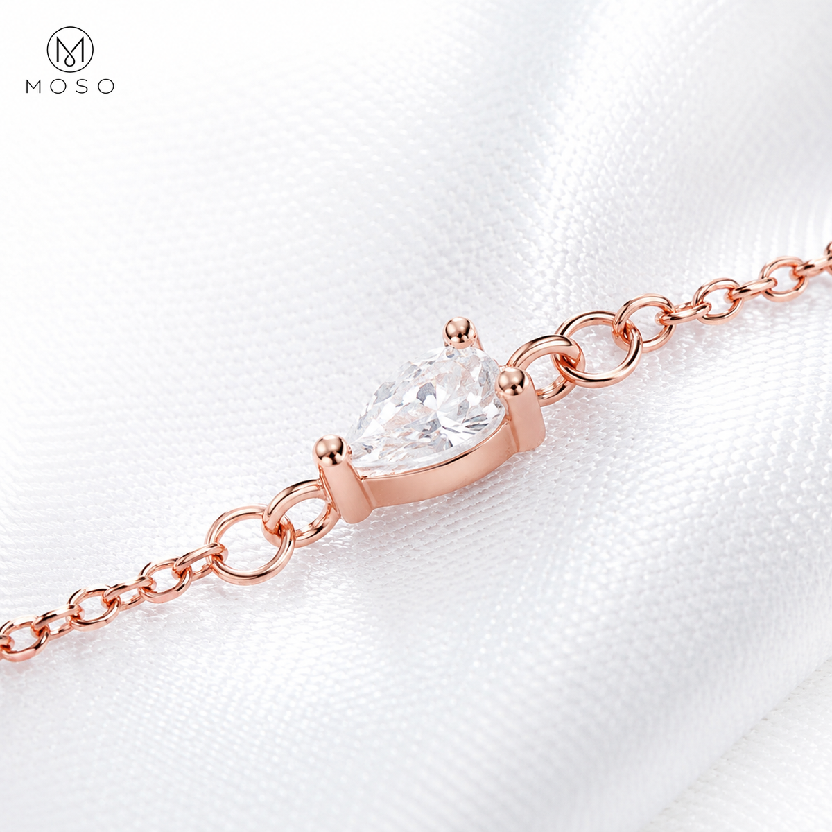 Brooklyn pear cut moissanite side profile and chain connection detail
