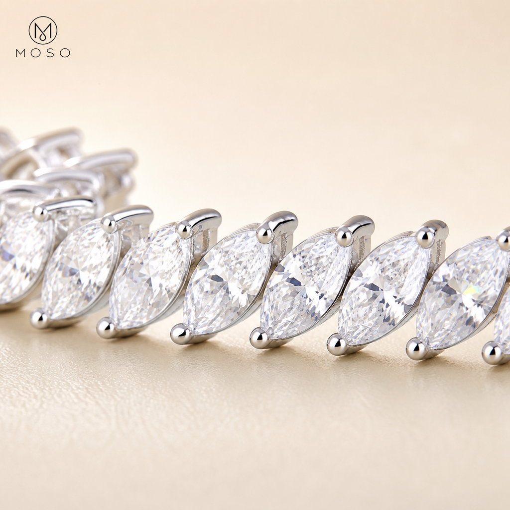 Macro of Camila 4 by 8 mm marquise moissanite stones