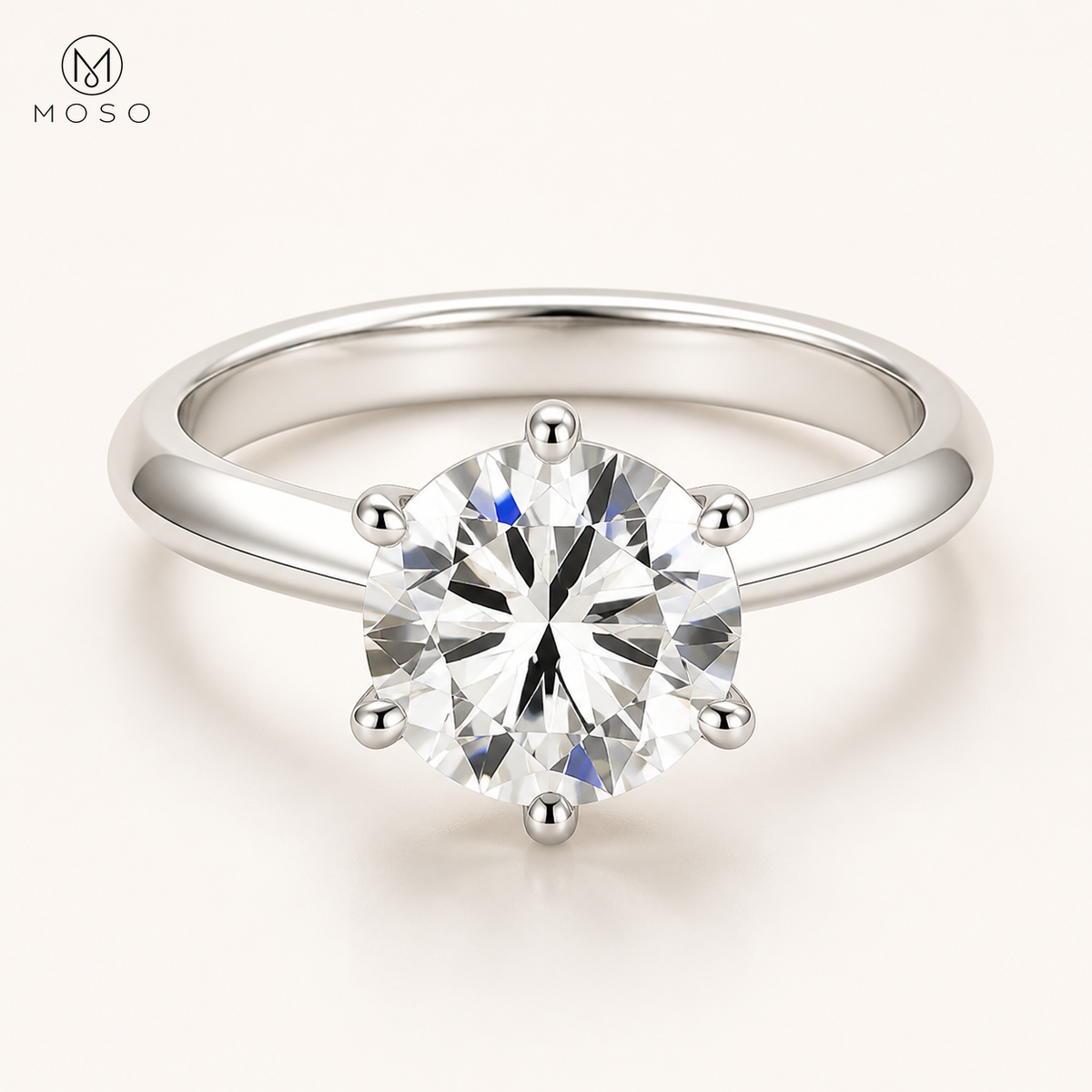 Charlotte round moissanite solitaire ring on ivory with MOSO logo