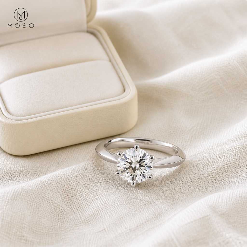 Charlotte round moissanite solitaire ring with ivory jewellery box
