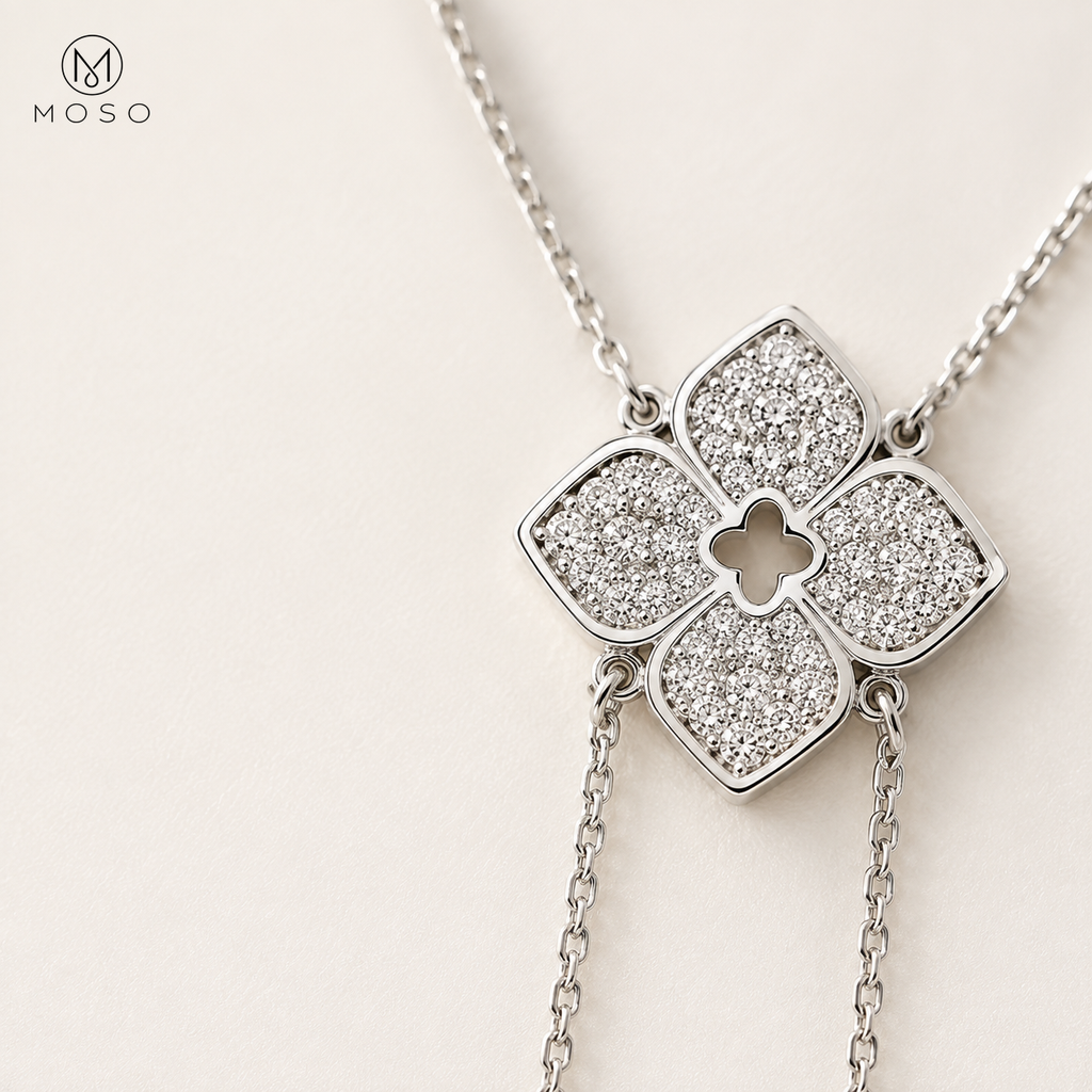 Close view of the Chloe four petal moissanite necklace centerpiece