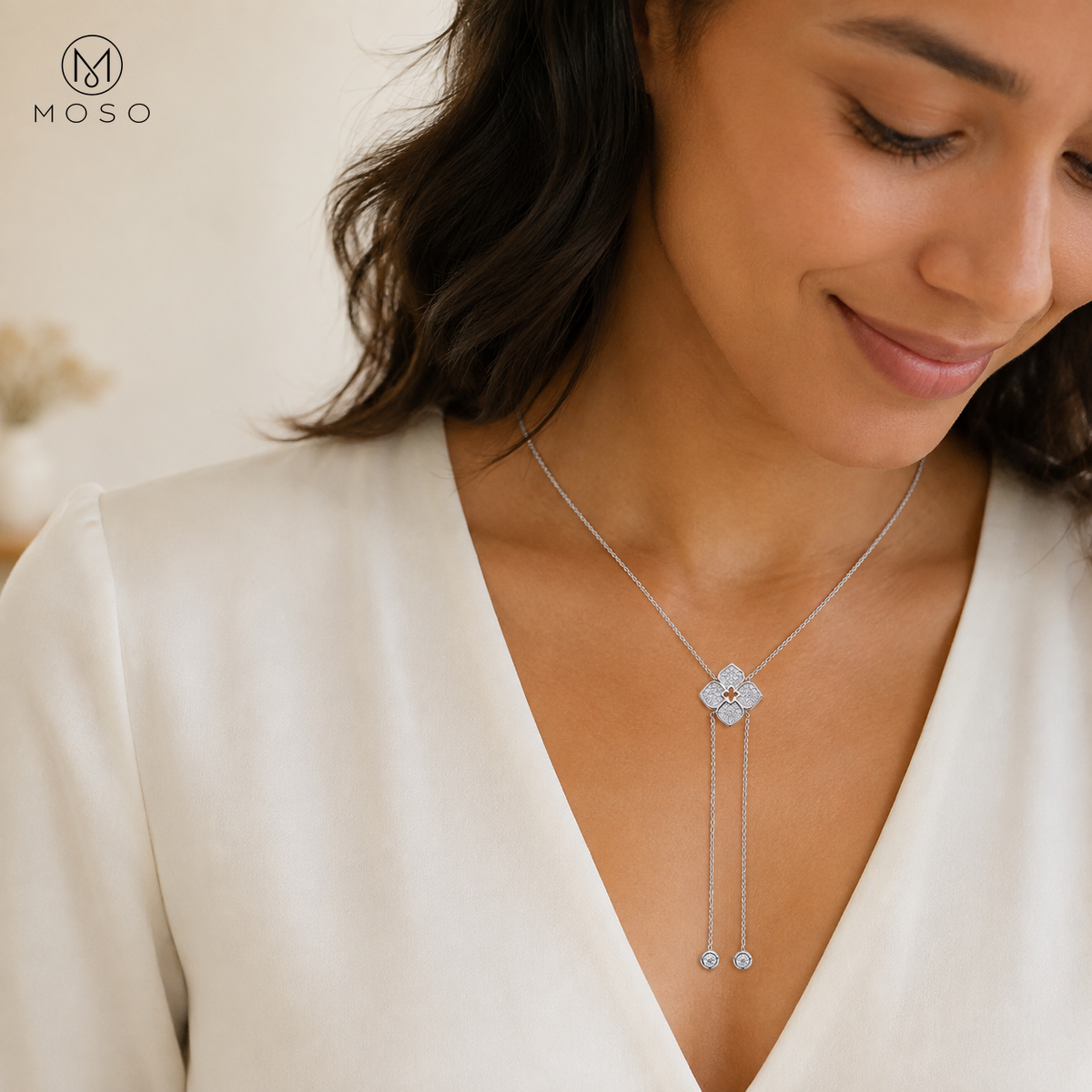 Chloe silver tone moissanite lariat necklace worn in natural daylight