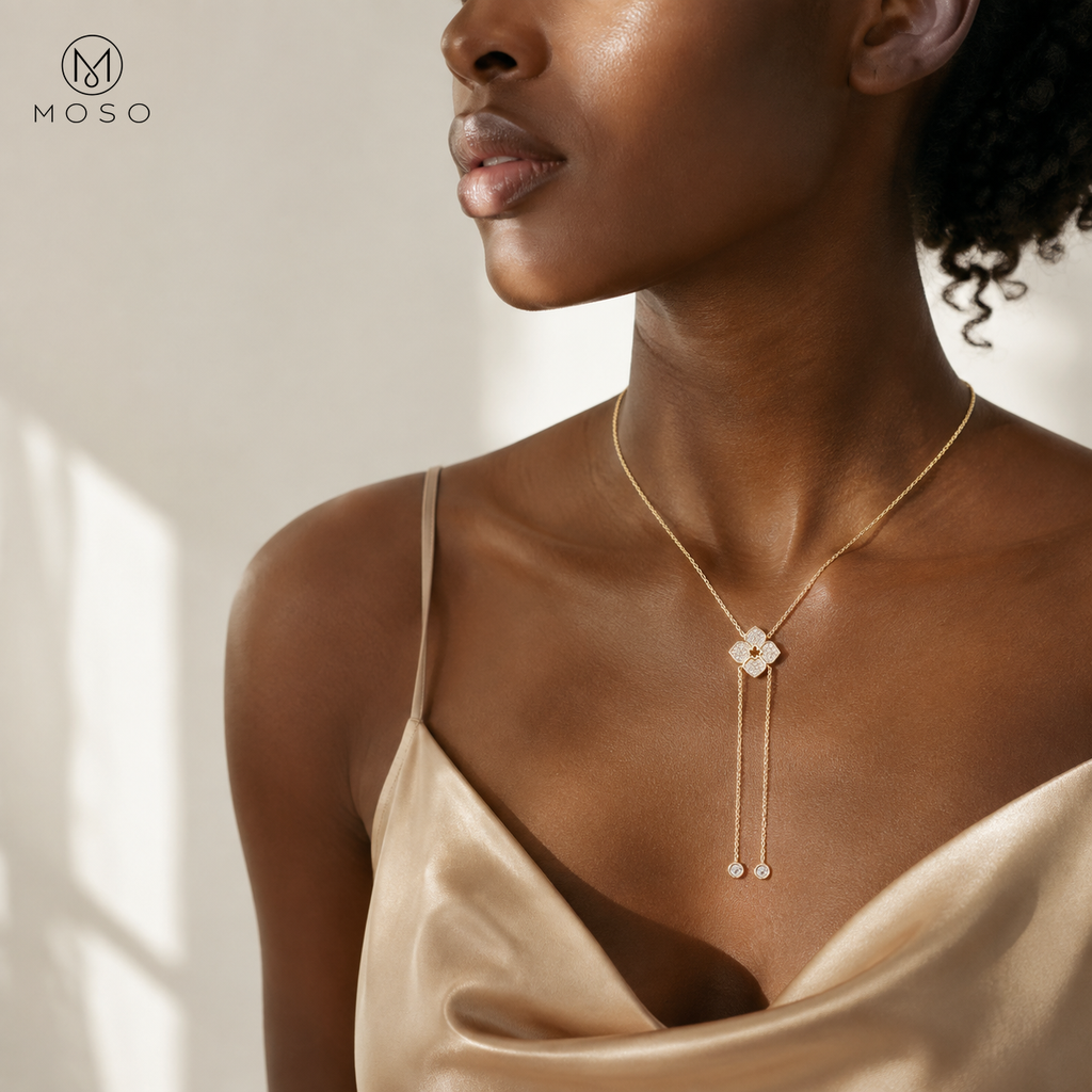 Chloe gold tone moissanite lariat necklace worn with a champagne look