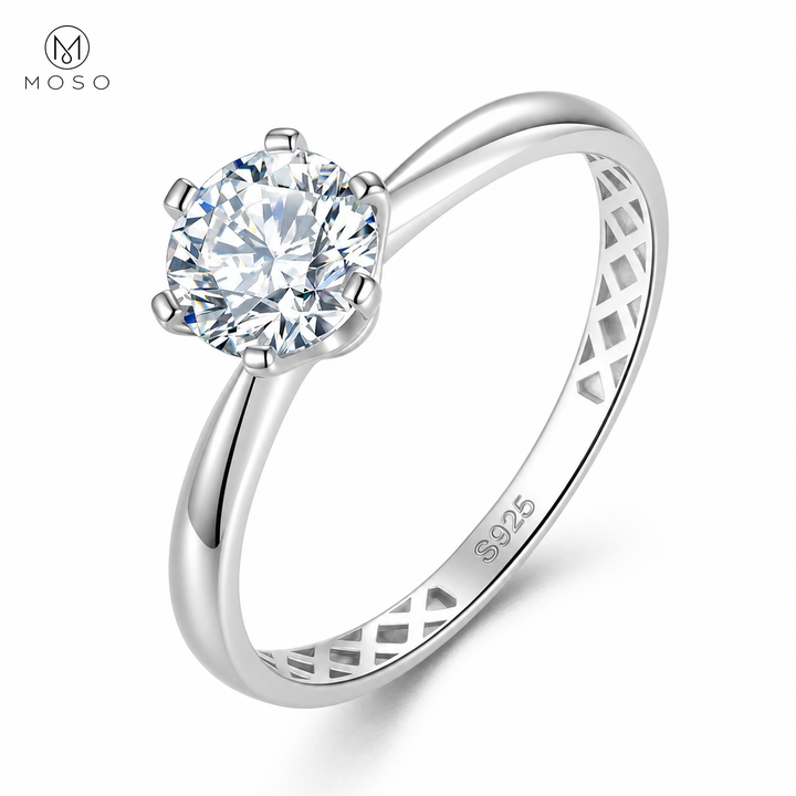 Claire round moissanite solitaire engagement ring on white background