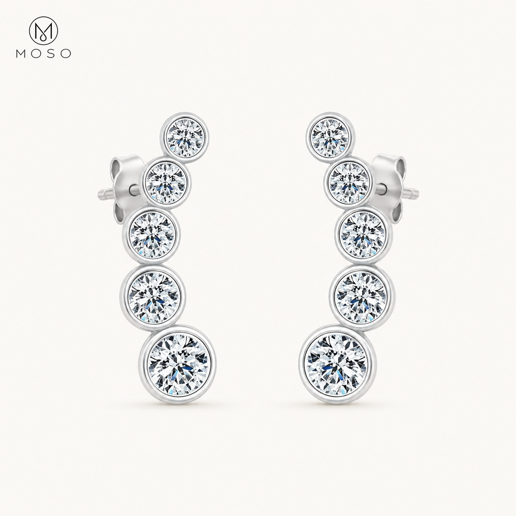 Eliana compact silver moissanite graduated drop earrings on ivory