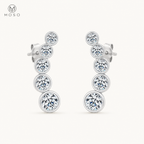 Eliana compact silver moissanite graduated drop earrings on ivory