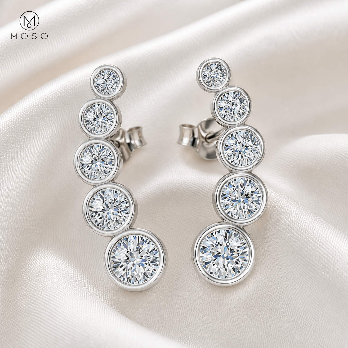 Eliana five stone silver moissanite drop earrings macro