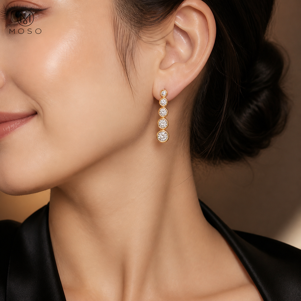 Eliana compact gold tone moissanite earrings worn for evening