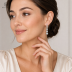Eliana long silver moissanite graduated drop earrings worn