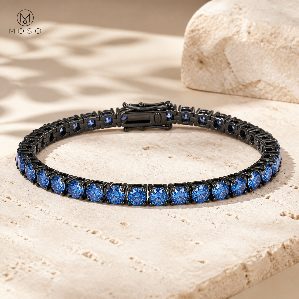 Ellie blue moissanite tennis bracelet with 5 mm stones on travertine