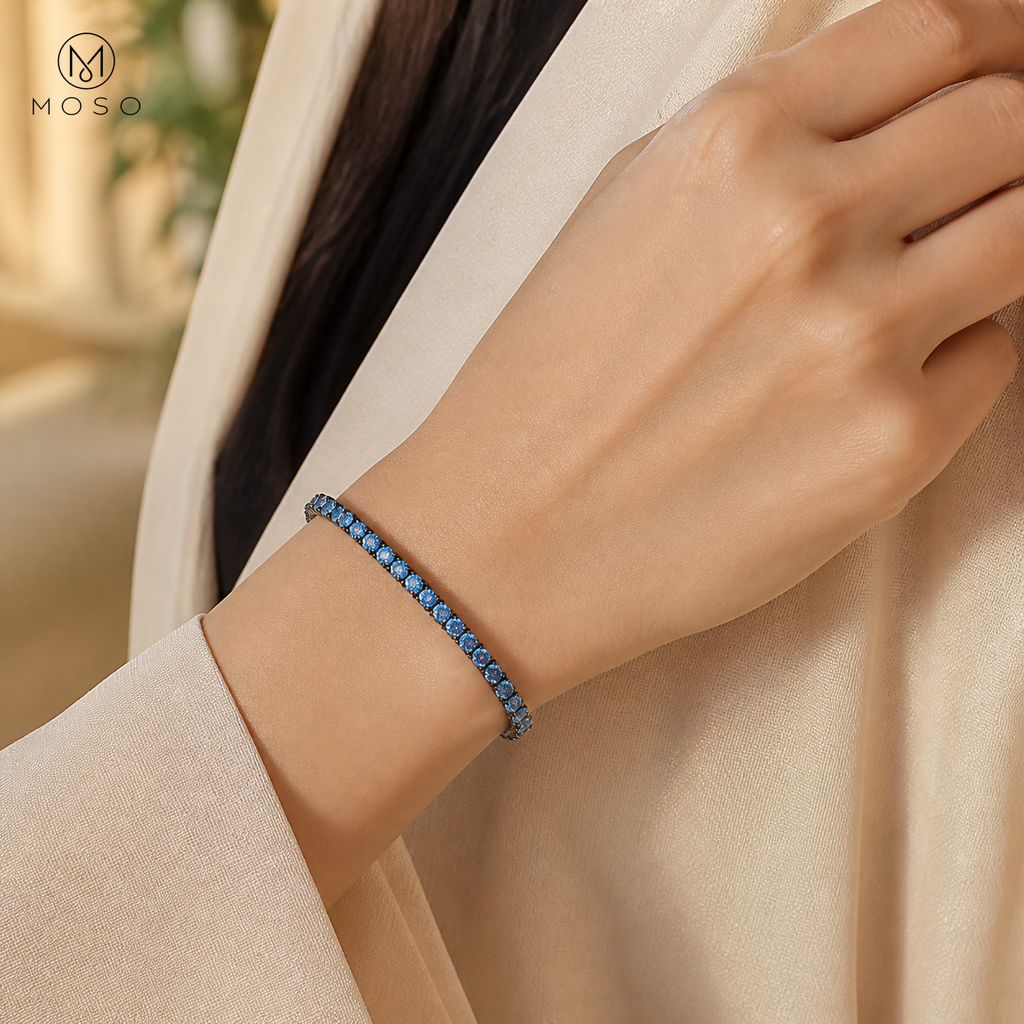 Woman wearing Ellie royal blue 3 mm moissanite tennis bracelet