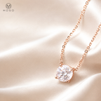 Emily rose gold colour round moissanite necklace on ivory silk