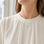 Emily silver colour round moissanite necklace worn in natural daylight