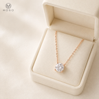 Emily rose gold colour moissanite necklace in an ivory gift box