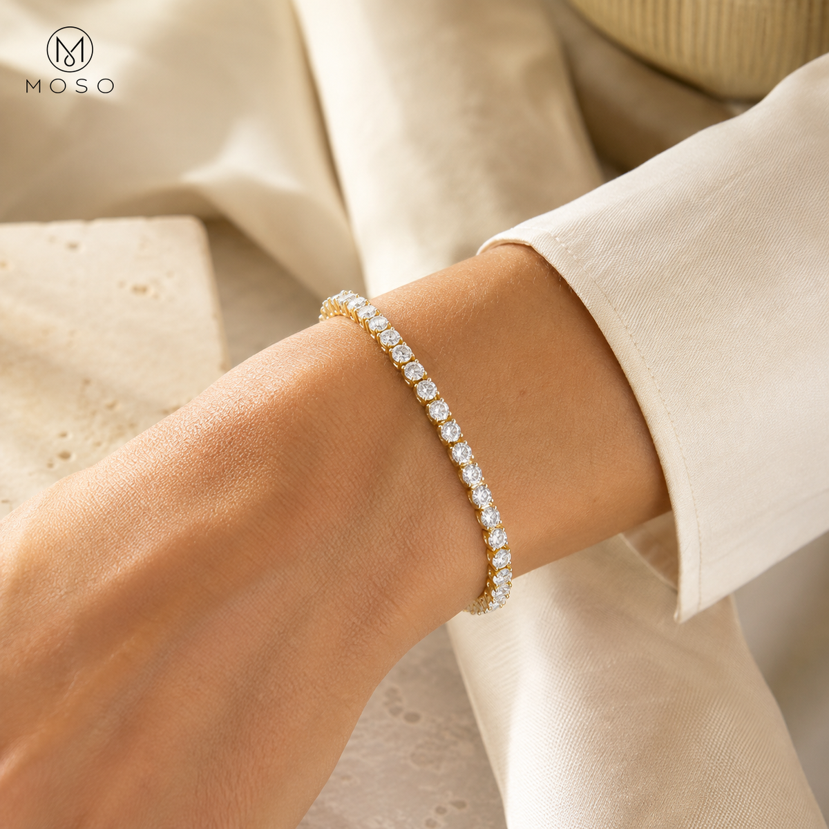 Emma gold plated moissanite tennis bracelet worn in daylight