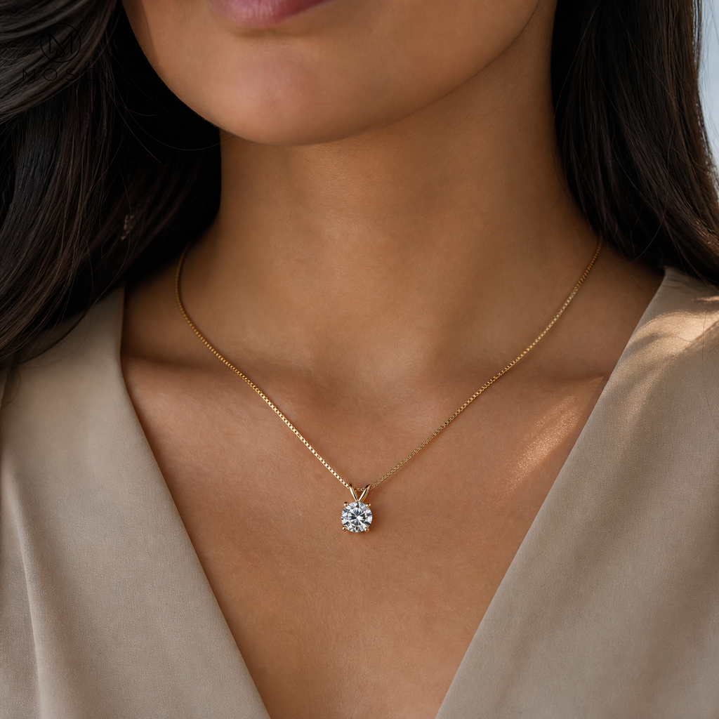 Grace gold tone moissanite necklace worn in daylight