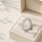 Hailey full eternity moissanite wedding band in an ivory jewelry box