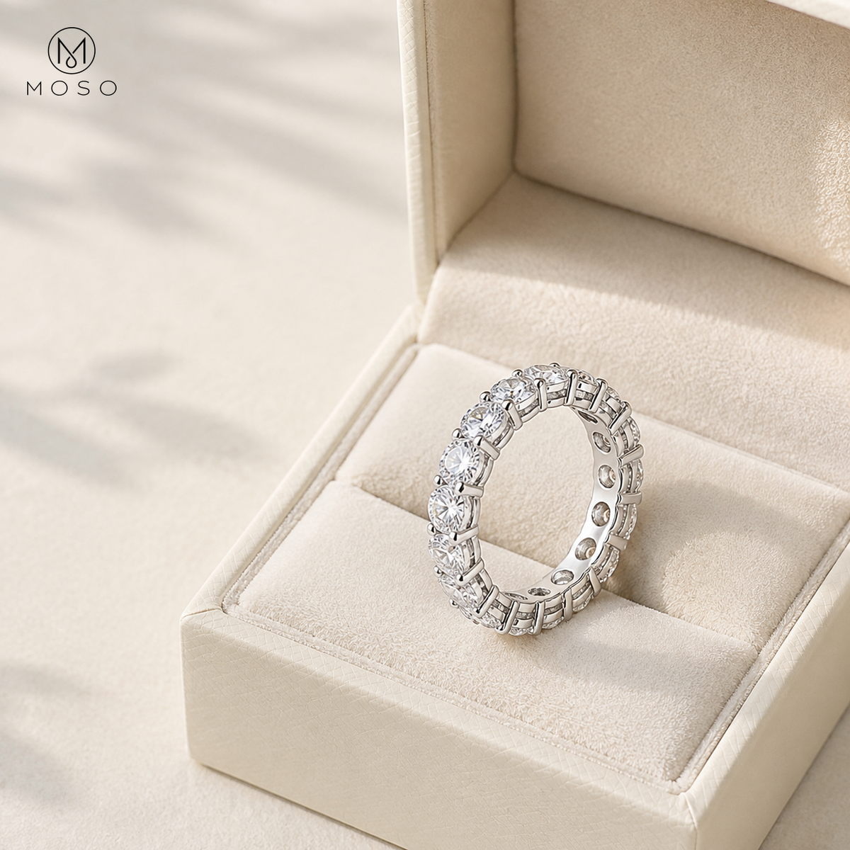 Hailey full eternity moissanite wedding band in an ivory jewelry box