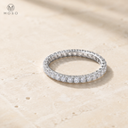 Hailey delicate 2mm round moissanite full eternity ring on pale stone