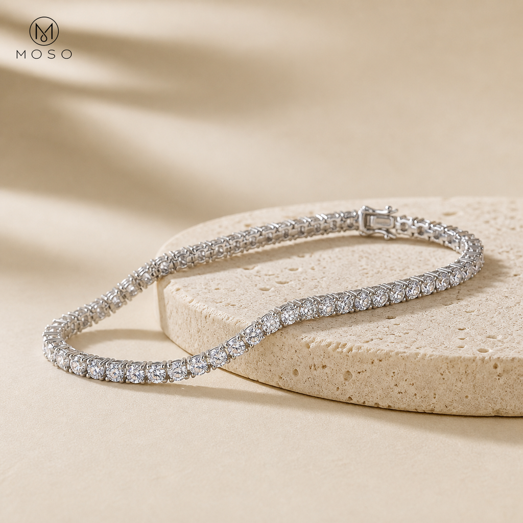 Hannah silver tennis bracelet on beige pedestal