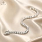 Hannah single row tennis bracelet on ivory satin