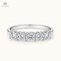 Harper 1.5ct five stone moissanite wedding band on ivory