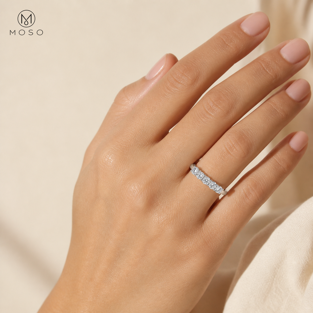 Woman wearing Harper clear moissanite wedding band