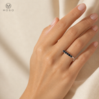 Woman wearing Harper black moissanite wedding band