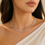 Woman wearing Hazel silver tone moissanite tennis necklace