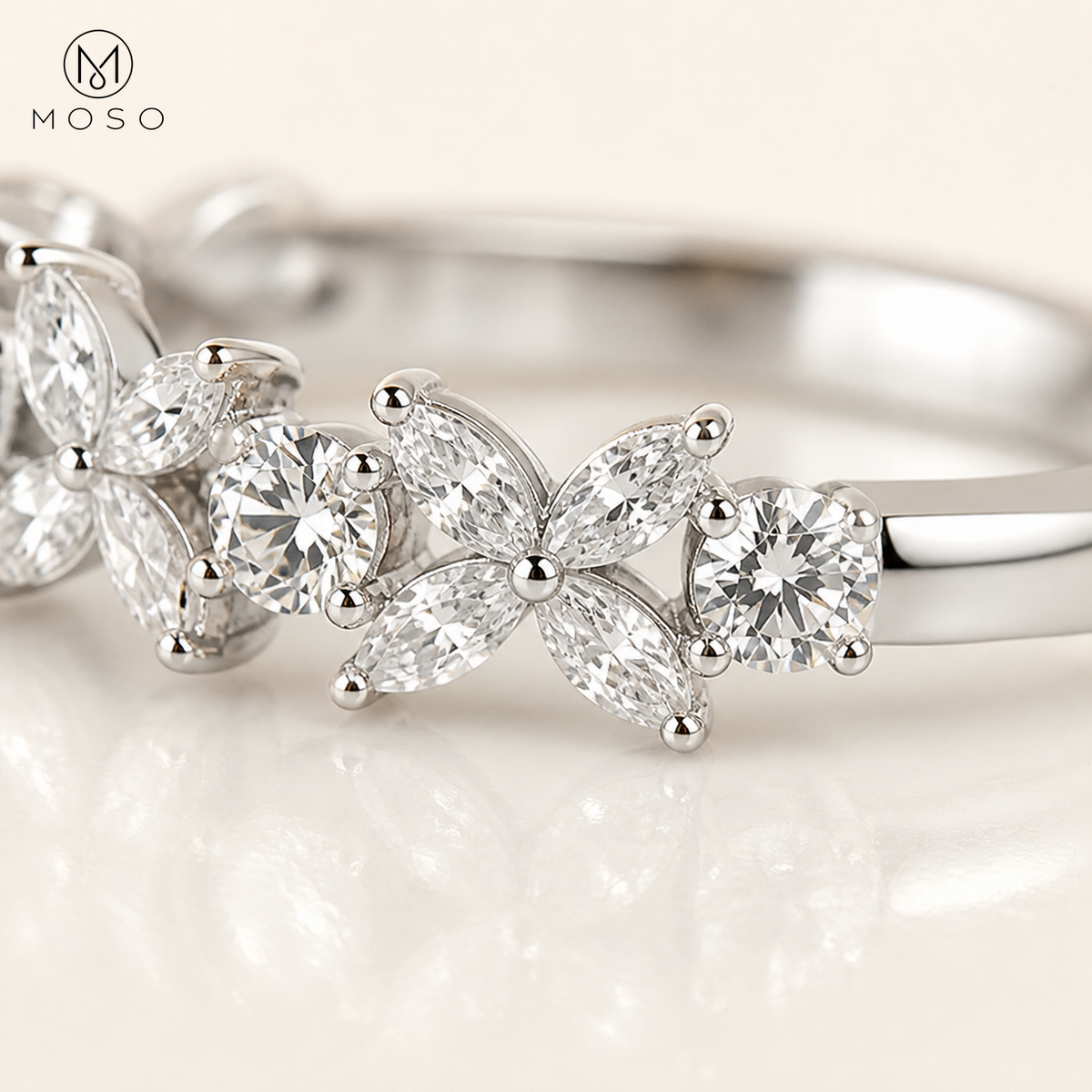 Macro view of Isabella marquise petal and round moissanite setting